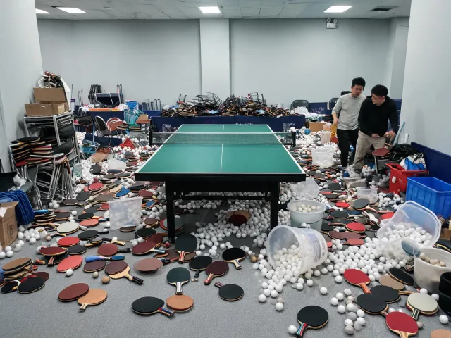 Crowded table tennis room before planning